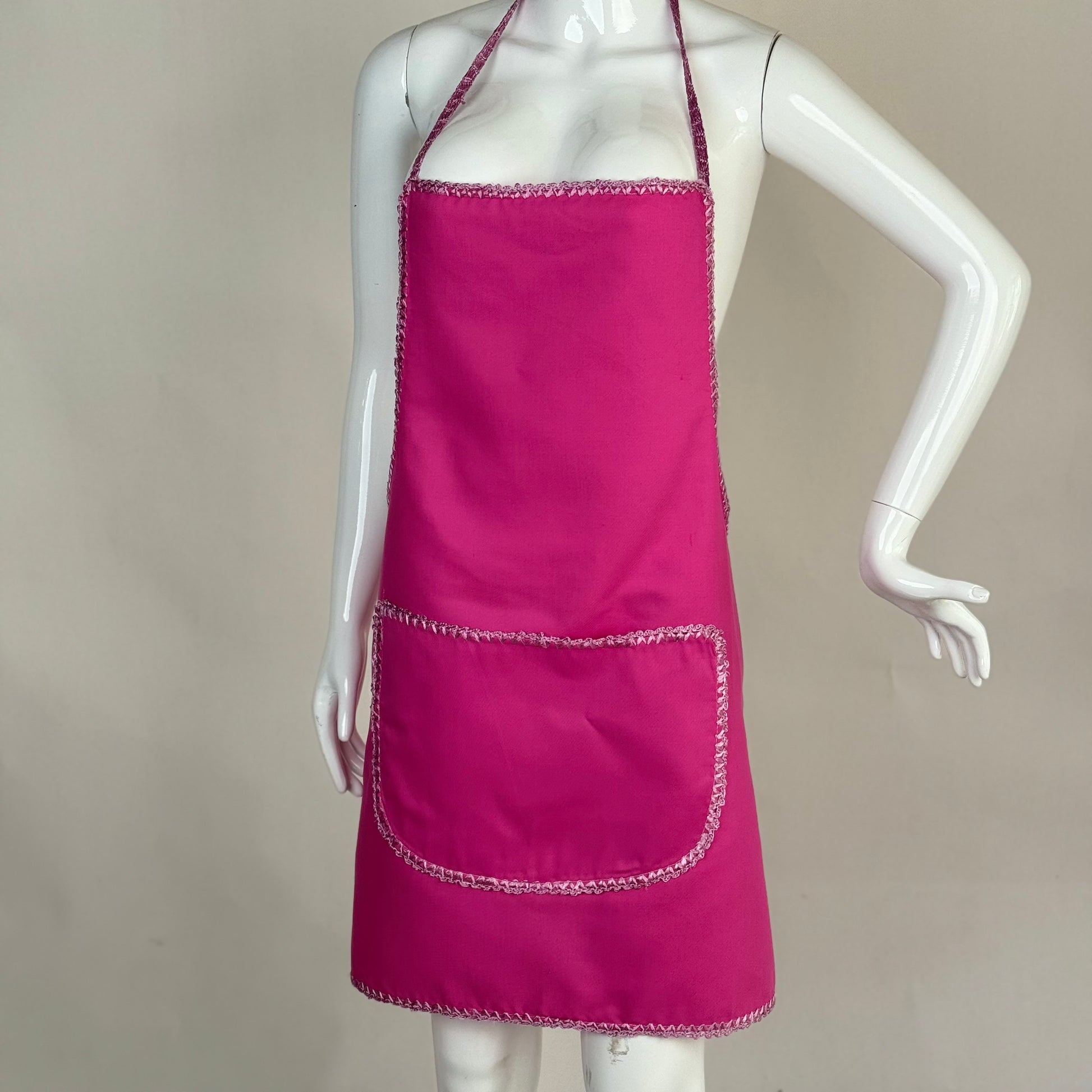 tablier de cuisine en rose fushia