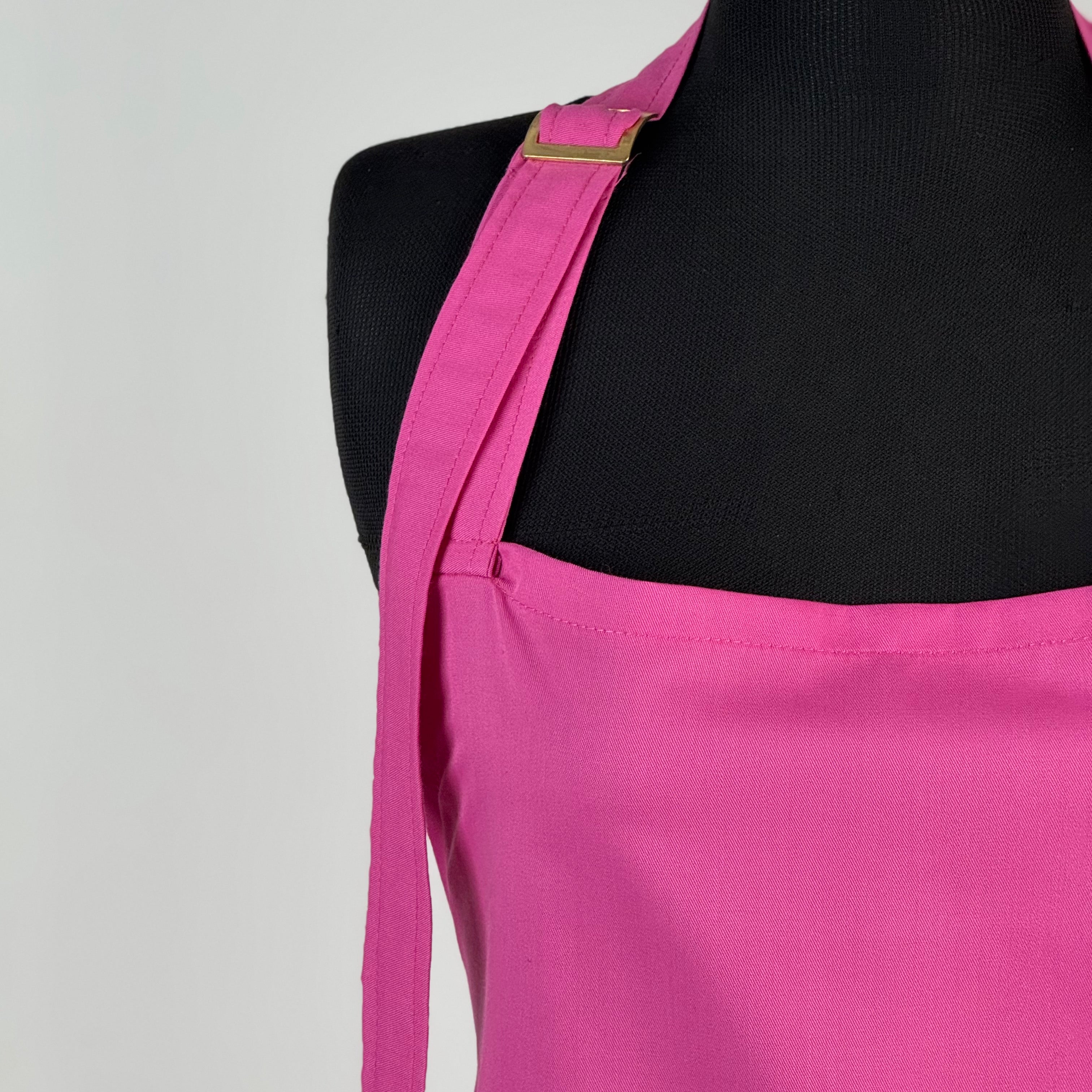 Tablier professionnel rose avec crochet