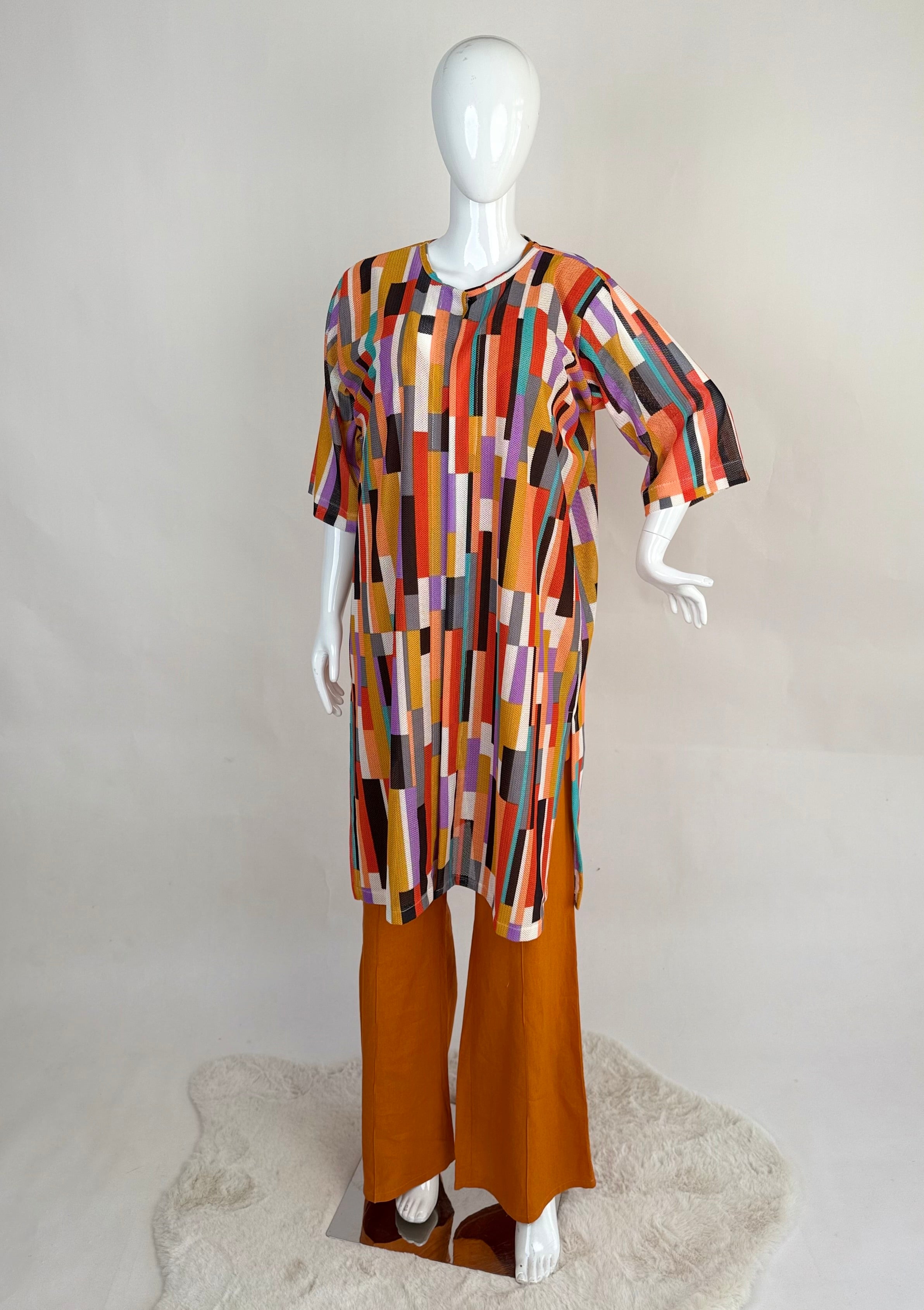 Ensemble oversize avec motif géométrique